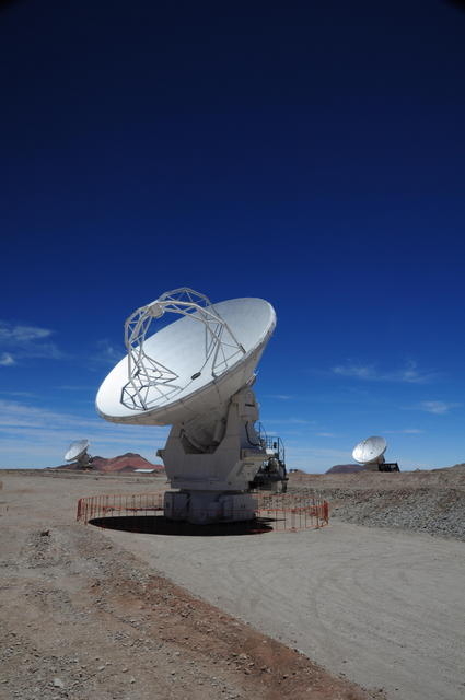 Three antennas at the AOS dawn at the AOS herald the start of ALMA Commissioning.